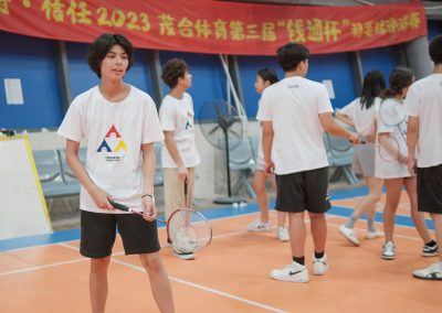 Badminton activities at Chinese Summer Camp, promoting physical fitness, teamwork, and fun for students