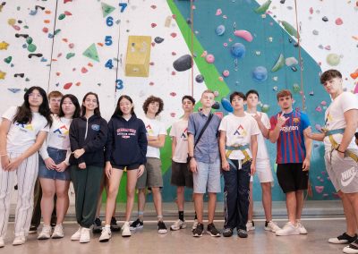 Rock climbing activities at Chinese Summer Camp, offering students outdoor adventure and teamwork-building experiences